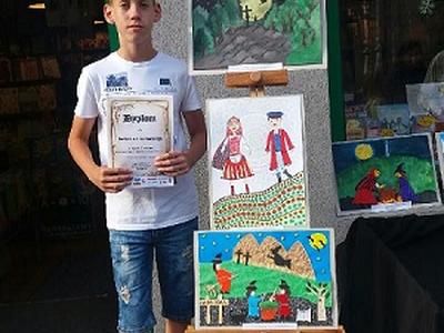 Laureat konkursu plastycznego-Bartłomiej Kozłowski z klasy V.