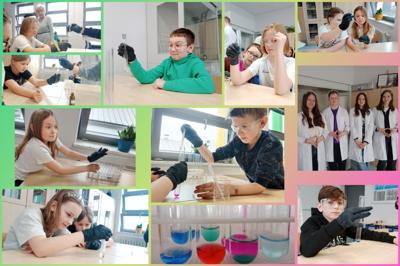 Uczniowie z klasy 3b wraz ze starszymi kolegami wykonują doświadczenia chemiczne, trzymają w dłoniach probówki, w których zaszły reakcje chemiczne.