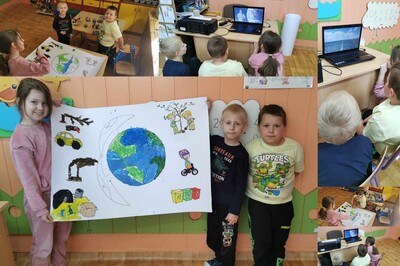 uczniowie z plakatem