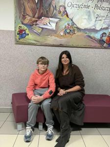 Jakub z Panią Martą Lewandowską opiekunem konkursu.