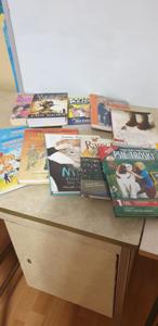na zdjęciu książki zakupione do biblioteki szkolnej
